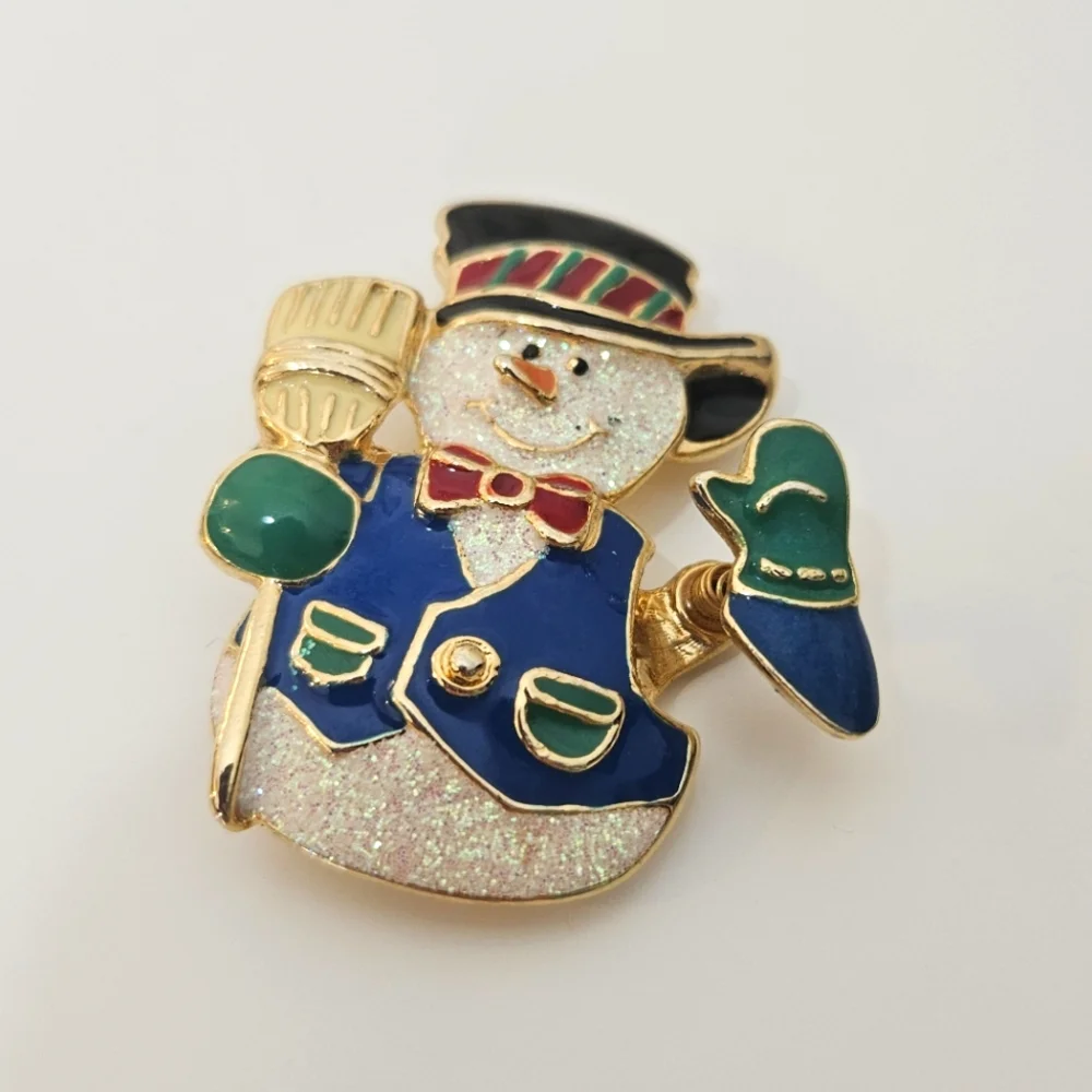 Snowman brooch/ pin sparkly, moving hand, gold toned, signed